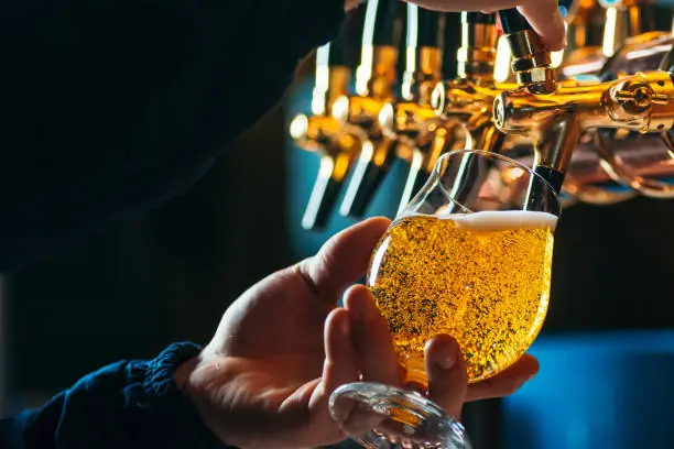 A draft beer being poured